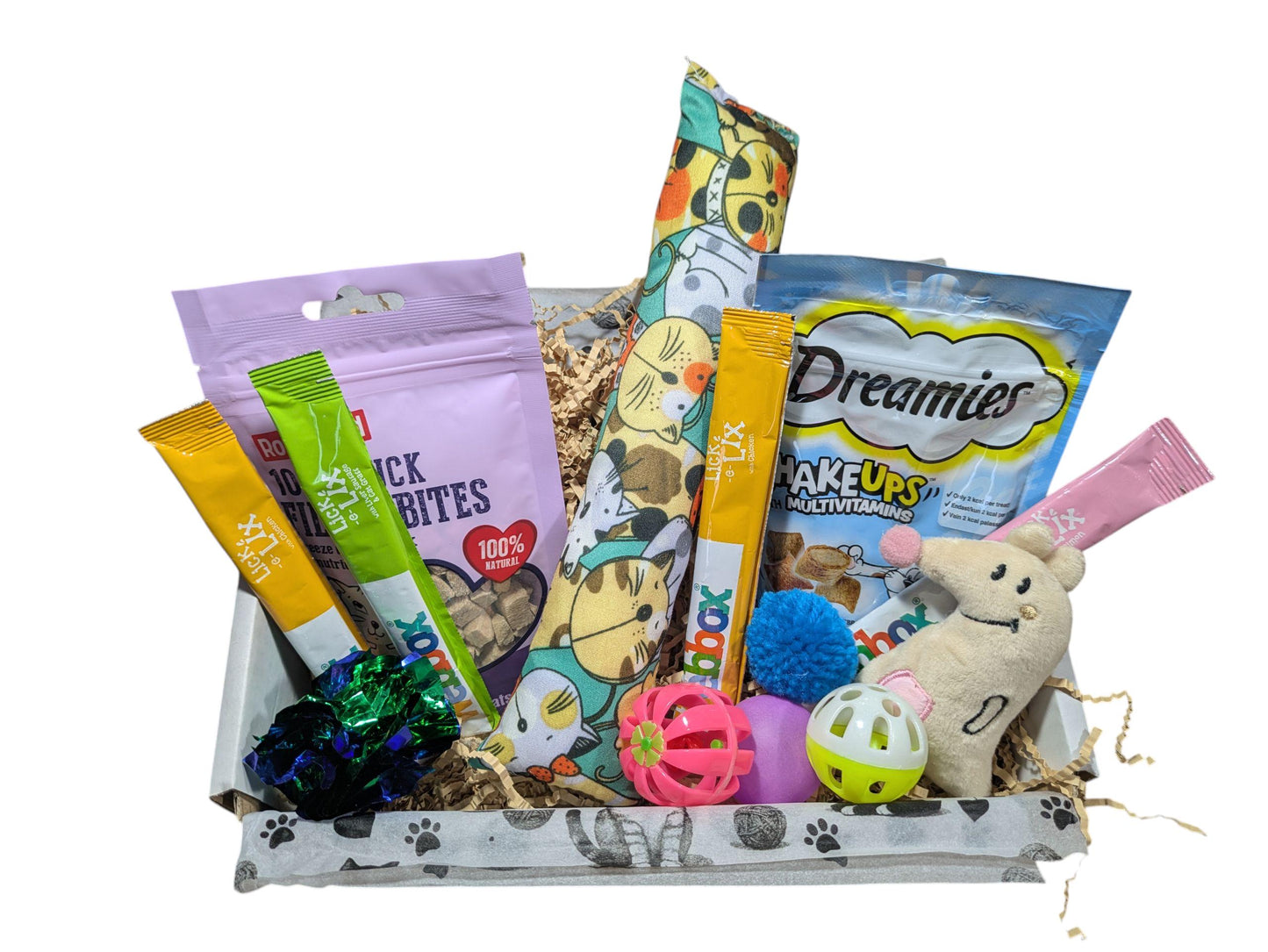 White open cat treat box filled with colorful catnip toys, treats, and a small plush mouse.