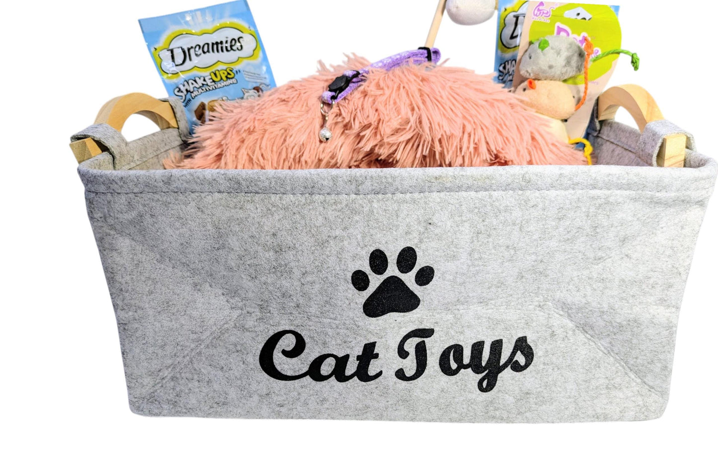 Gray felt cat toy storage box filled with pink plush bed, cat treats, and toys.