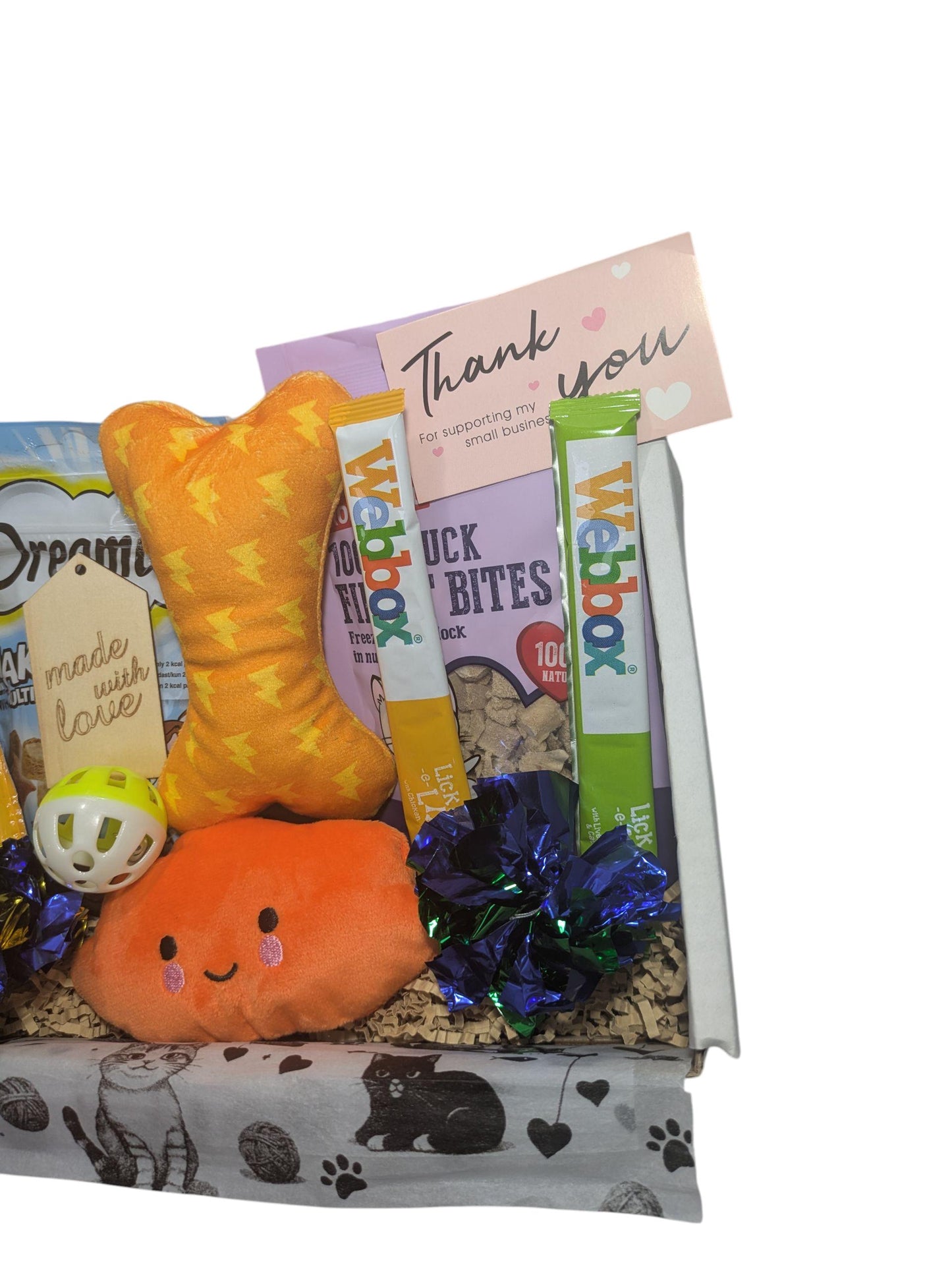 Personalised cat gift box with orange plush bone and crab toys, catnip balls, treats, and thank you card.