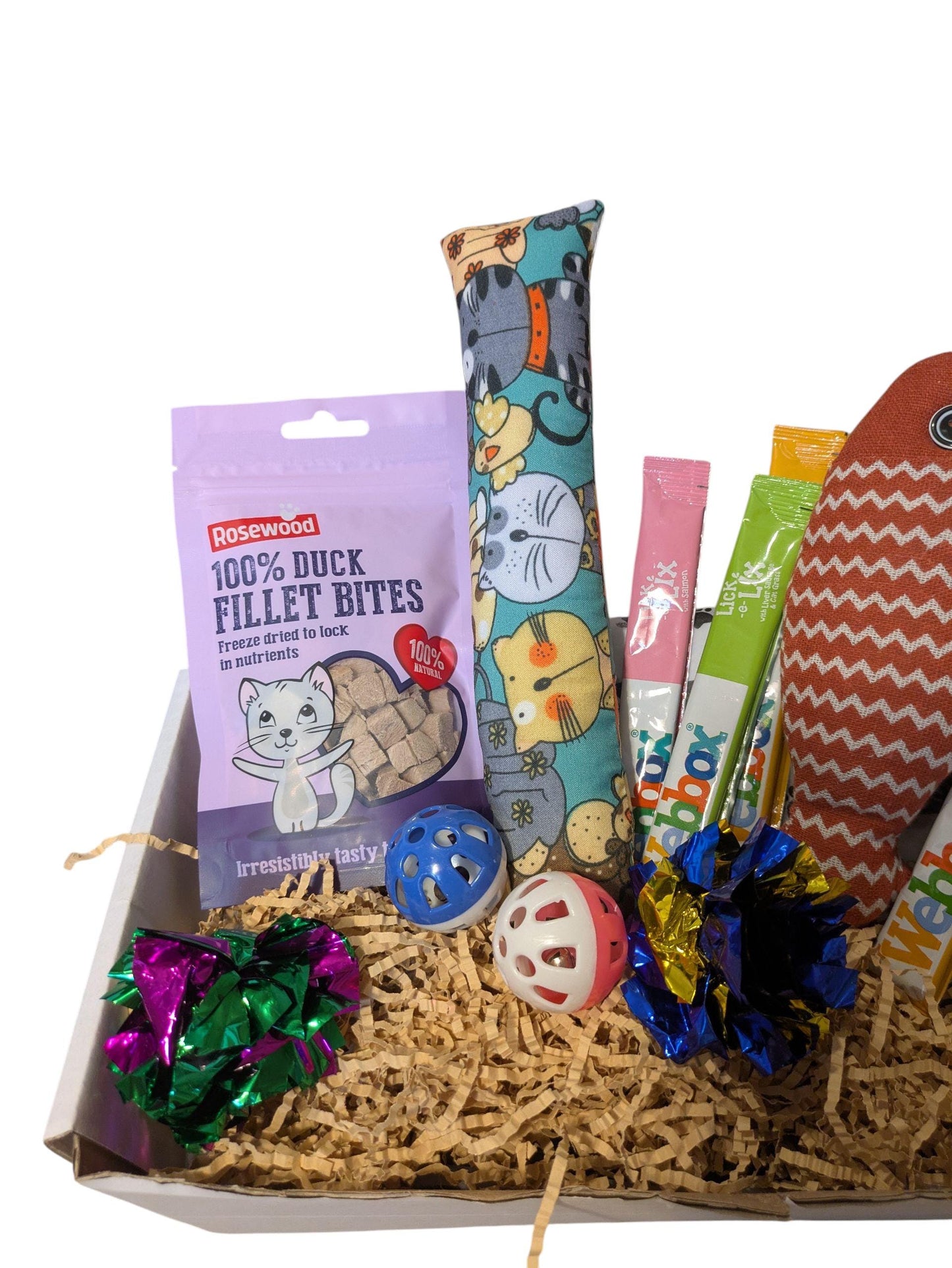 Personalised cat treat box with duck fillet bites, catnip toys, colorful balls, and feather teaser in cardboard hamper.