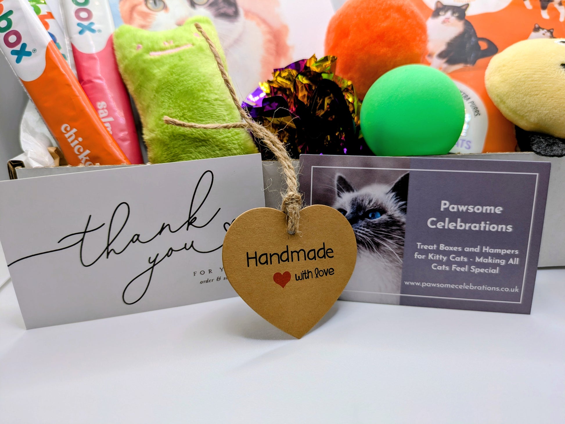 Thank you card and a pawsome celebrations business card