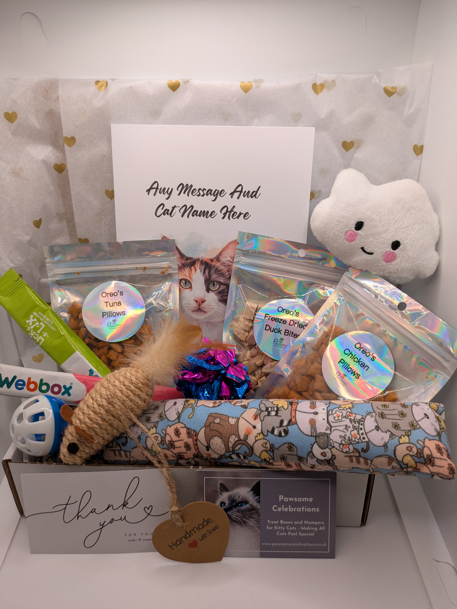 Cat treat Hamper with catnip cat kicker toy, sisal mouse, other toys, treats, and a personalised card.
